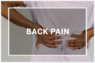 A person clutching their lower back in pain
